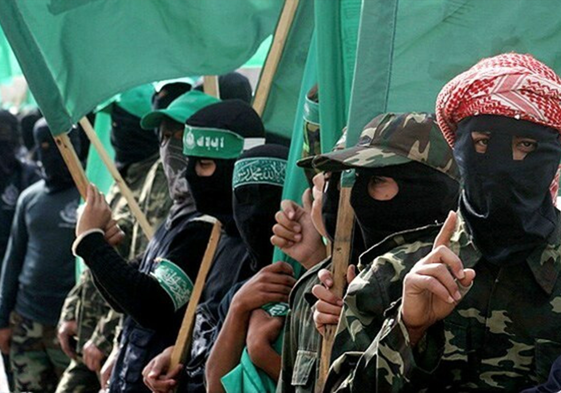 Hamas Soldiers in front of Green Flag